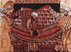 Miniature from Rashid al-Din Hamadani's Jami al-Tawarikh, c. 1315, illustrating the story of Muhammad's role in re-setting the Black Stone in 605 (Ilkhanate period)[78]