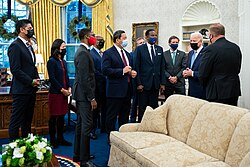 Pureval (far left) and other newly-elected mayors meet with President Joe Biden in December 2021