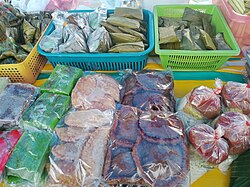 Variety of traditional kuih sold at a tamu (weekly market) in Papar, Malaysia