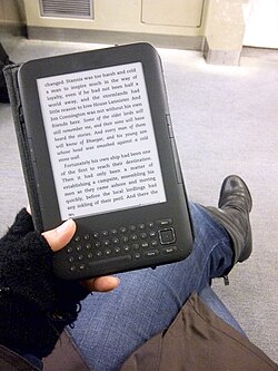 Reading an e-book (A Dance with Dragons) on a third-generation Kindle