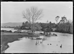 Wharf and small jetty where the Waikato River departs the lake, 1928