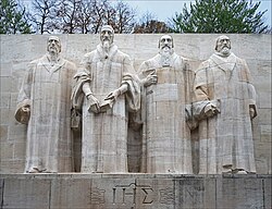 Central group of the Reformation Wall in Geneva, commemorating the founding fathers of Calvinism: William Farel, John Calvin, Theodore Beza, and John Knox.