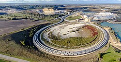 Frac sand mine in the Town of Oakdale, Wisconsin with a large looped track with 3 rail lines