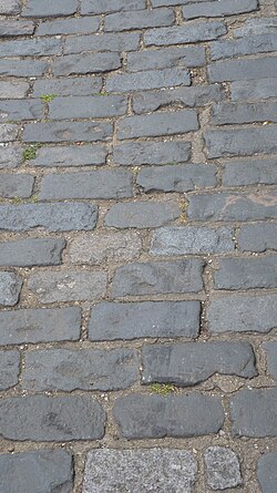 Sett-paving, such as this surface in Fulham, south-west London, is also often referred to as "cobblestones".