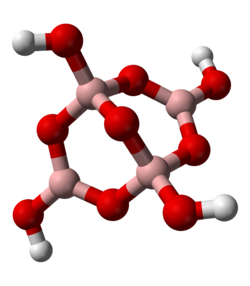 Ball-and-stick model of tetraborate anion, [B4O5(OH)4]2−, as it occurs in crystalline borax, Na2[B4O5(OH)4]·8H2O. Boron atoms are pink, with bridging oxygens in red, and four hydroxyl hydrogens in white. Note two borons are trigonally bonded sp2 with no formal charge, while the other two borons are tetrahedrally bonded sp3, each carrying a formal charge of −1. The oxidation state of all borons is III. This mixture of boron coordination numbers and formal charges is characteristic of natural boron minerals.