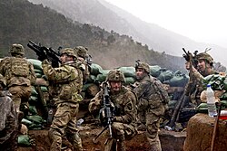 U.S. Army soldiers with the 2nd Battalion, 327th Infantry Regiment, 101st Airborne Division returning fire during a firefight with Taliban forces in Barawala Kalay Valley in Kunar province, Afghanistan, March 2011