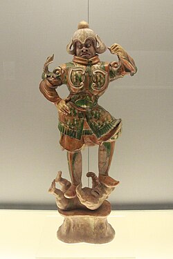 Sancai lead-glazes in a Tang dynasty tomb guardian