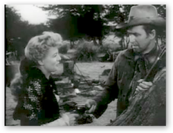 Stewart with Shelley Winters in Winchester '73, his first project with Anthony Mann. In the 1950s, Stewart redefined his career as a star of Western films.
