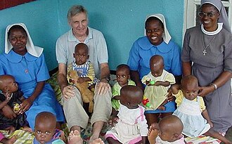 Sisters (with chaplain) working at Mother of Peace AIDS orphanage in Zimbabwe, to prepare for opening another orphanage