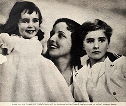 Taylor (left) at age two with her mother Sara Sothern (center) and brother Howard (right) in 1934