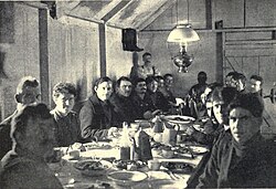 Early-20th-century dinner in a miners' boarding house in northern Canada