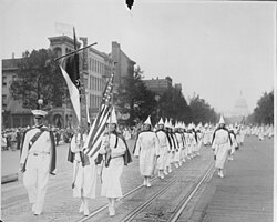 Ku Klux Klan members march down Pennsylvania Avenue in Washington, D.C. in 1928. The second era Klan was a large nationwide movement with between four million and six million members.