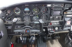 The altimeter on this Piper PA-28 is seen on the top row of instruments, second from right.