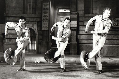 Kidd's (left) screen acting debut, dancing with Gene Kelly and Dan Dailey in It's Always Fair Weather (1955)