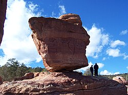 This balancing boulder, "Balanced Rock", stands in Garden of the Gods park in Colorado Springs, Colorado, United States.
