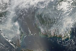 Fires on Borneo and Sumatra, 2006. People use slash-and-burn deforestation to clear land for agriculture.