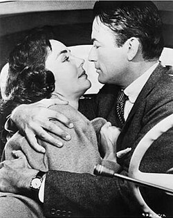 Peck with Jennifer Jones in a film still for The Man in the Gray Flannel Suit (1956)