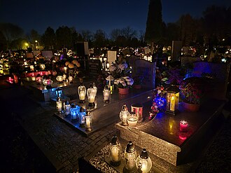 Graves in a Polish cemetery, decorated with candles for All Saints' Day on November 1st, Zabrze, Silesian Voivodeship, Poland