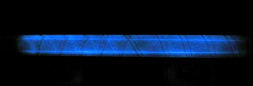 Phosphorescence in fused quartz from an extremely intense pulse of UV light in a flashtube, centered at 170 nm