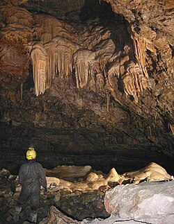 Speleothems in Hall of the Mountain King of Ogof Craig a Ffynnon, a solutional cave in South Wales.