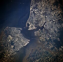 Newport News, Hampton, Isle of Wight County, Suffolk, Chesapeake, Portsmouth and Norfolk, from space, July 1996. Norfolk is located in the upper-right quadrant; east is at the top.