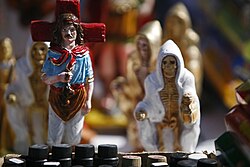 Gauchito Gil (left) and San La Muerte (right), two examples of Argentine folk saints