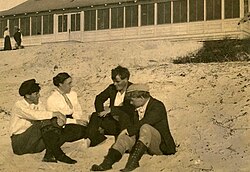 Carmel became a hub for artists and writers in the early 1900s. Pictured are George Sterling, Mary Austin, Jack London, and Jimmie Hopper at Carmel Beach, c. 1905.