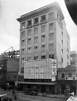 Blundell Bros Limited Head Office on Willis Street, WellingtonPrinting and publishing is in the linked building at the rear fronting onto Boulcott Street. Returns for the 1928 general election are visible on the front of the building.