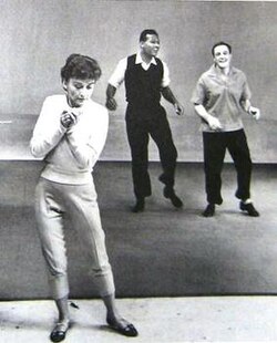 Kelly in rehearsal with Sugar Ray Robinson and assistant Jeanne Coyne, his future wife in the NBC Omnibus television special Dancing is a Man's Game, 1958