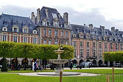 The Place des Vosges, the oldest planned square in Paris
