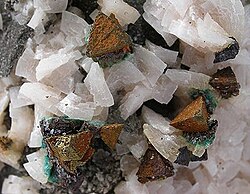 Dolomite with calcite and chalcopyrite from the Picher Field, Tri-State district, Cherokee County, Kansas; 12.0 × 9.7 × 4.3 cm