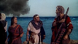 Olive Deering, Robinson, and Charlton Heston, in The Ten Commandments.