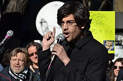 Swartz in 2012 protesting against the Stop Online Piracy Act (SOPA), along with Occupy Wall Street movement