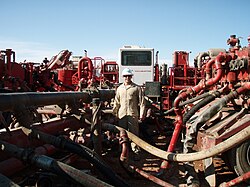 Example of high pressure manifold combining pump flows before injection into well