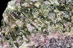 Elbaite tourmaline (olive-green) and lepidolite mica (violet), from a lithium-enriched pegmatite in Brazil