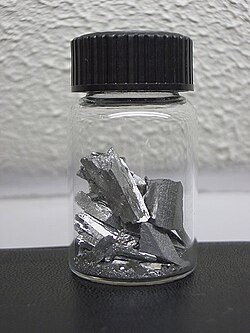 Pieces of tellurium in a vial