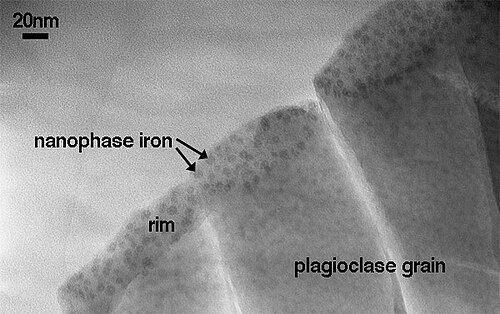 TEM image of space weathered rim on a grain of lunar soil 10084