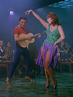 Loren in It Started in Naples (1960), in which she famously sang "Tu vuò fà l'americano"
