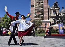 A couple dancing cueca during the celebration of Cueca Day in Plaza Murillo, La Paz, Bolivia