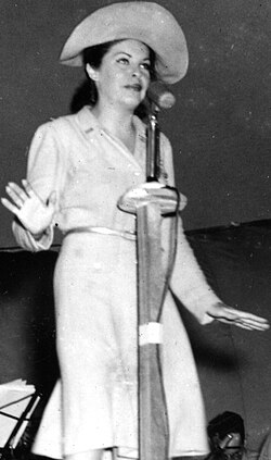 Raye performing for troops in Africa, 1943