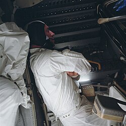 Lovell tries to rest in the frigid spacecraft