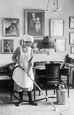 A maid cleaning in Denmark in 1912.