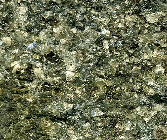 Close-up view of a cumulate rock from Montana (scale: about 45 millimetres (1+3⁄4 in) across)