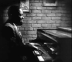 A screen capture from the 1947 film The Fabulous Dorseys, showing Tatum's straight-fingered technique