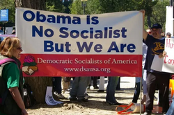 2009 DSA convention banner reading "Obama Is No Socialist, But We Are"