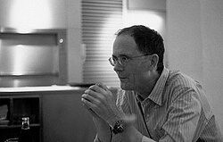 William Gibson in Bloomsbury, London in September 2007. His fiction is hailed by critics for its characterization of late capitalism, postindustrial society and the portents of the information age.