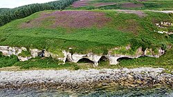 Relict sea-cliffs at King's Cave on Arran's south-west coast
