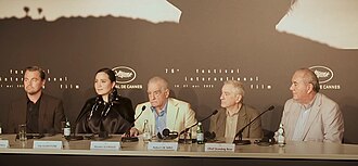 Gladstone at the 2023 Cannes Film Festival with Leonardo DiCaprio, Martin Scorsese, Robert De Niro, and Principal Chief Geoffrey Standing Bear