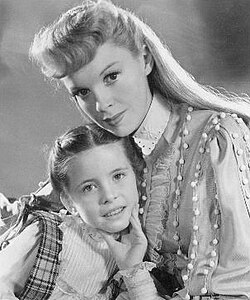 Garland with Margaret O'Brien in a publicity photo for Meet Me in St. Louis (1944)