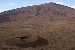 Parasitic cone (in foreground) with larger main cone in background, at Piton de la Fournaise volcano on the island of Réunion.